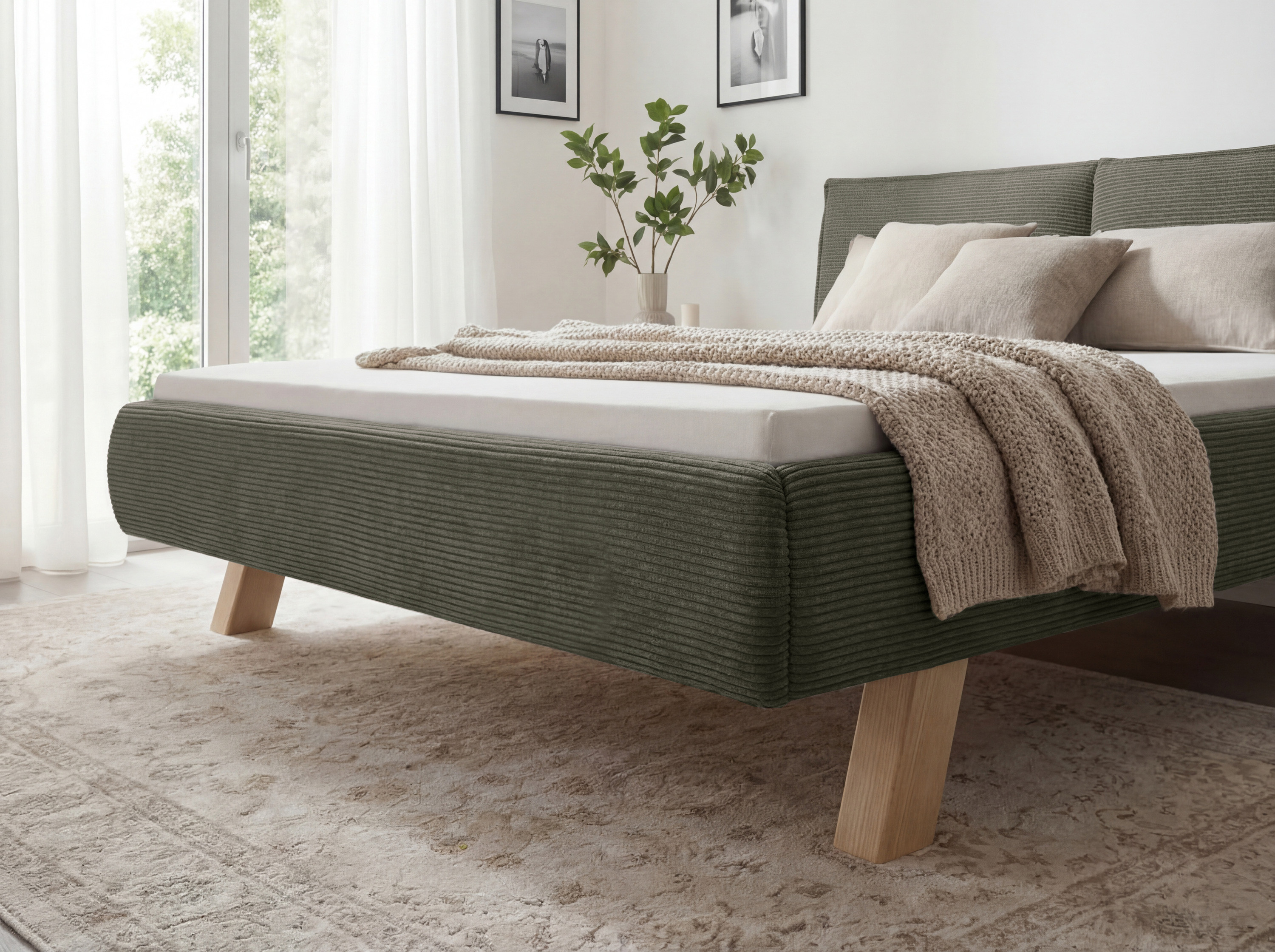 Látková posteľ na nohách zelená